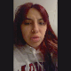 An Hispanic girl glances back at the camera while standing and taking a shit into a toilet while spreading her ass cheeks. Presented in 720P vertical HD format. About a minute.